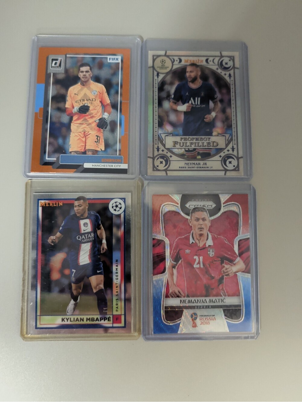 Set of 4 Soccer Trading Cards featuring Ederson, Neymar Jr, Kylian Mbappe, Matic